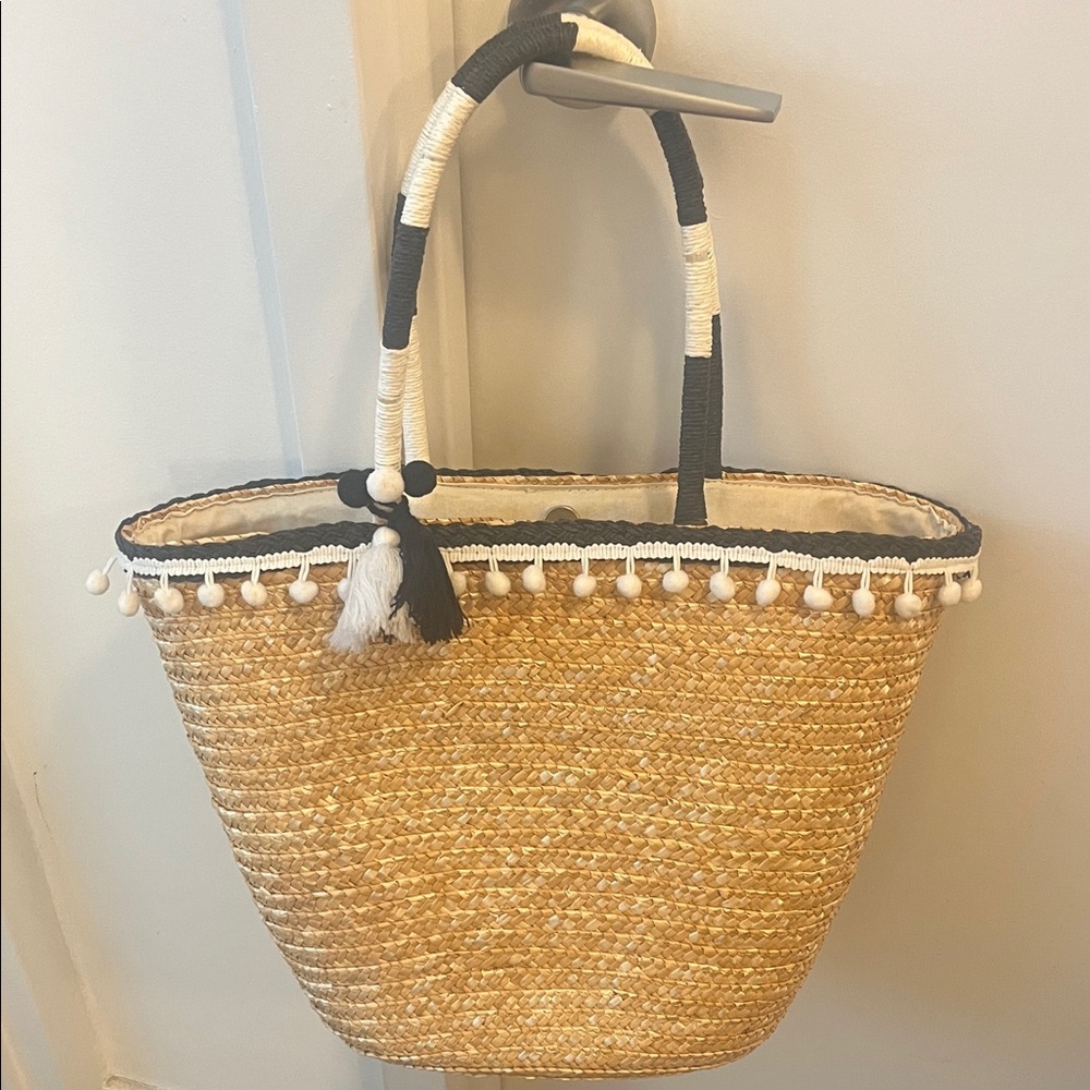 Stylish Tan Straw Tote Bag with Black Accents